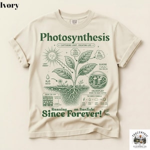 May include: An ivory t-shirt featuring a dark green graphic print of a photosynthesis diagram. The design includes a sun, a plant with roots, chemical formulas, and text that reads Photosynthesis, Capturing Light, Creating Life, and Running on Sunlight Since Forever!