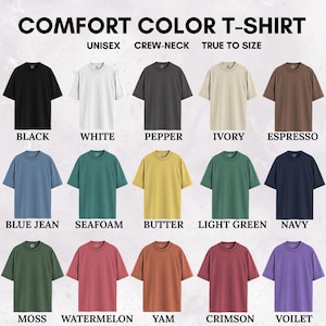 May include: A collection of fifteen short-sleeved crew-neck t-shirts displayed in a grid. The shirts are available in various solid colors including black, white, pepper, ivory, espresso, blue jean, seafoam, butter, light green, navy, moss, watermelon, yam, crimson, and violet. The text COMFORT COLOR T-SHIRT, UNISEX, CREW-NECK, TRUE TO SIZE is visible at the top.