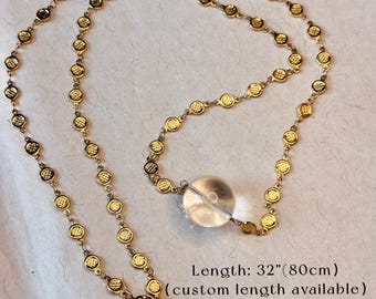 May include: A gold-toned chain necklace featuring small, circular, textured metal links and a single, clear, spherical glass pendant. The necklace has a total length of 80 cm. The text on the image reads: Length: 32"(80cm) (custom length available).