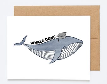 May include: A graduation card featuring a blue whale wearing a graduation cap. The text "WHALE DONE" is written above the whale. The card is on a white background with a brown envelope.