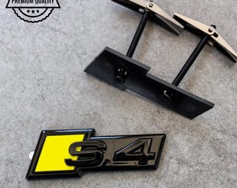 Audi S4 Grille Emblem Glossy Black with Yellow High-Quality Front Badge Stylish OEM Replacement Sleek and Sporty Upgrade New