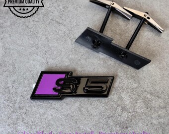 Audi S5 Grille Emblem Glossy Black with Purple High-Quality Front Badge Stylish OEM Replacement Sleek and Sporty Upgrade New