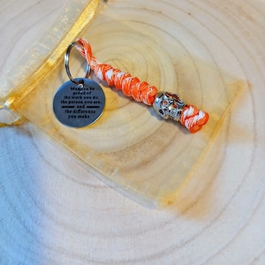 Skull & Strength Keyring – Paracord Fob with Skull Bead and Inspirational Quote