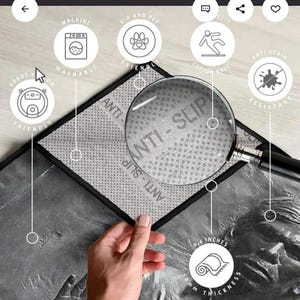 May include: A grey anti-slip rug with a black border, featuring a detailed relief design. The rug is 10 mm thick and has a cotton base. It is machine washable, robot vacuum friendly, kid and pet friendly, and stain resistant.