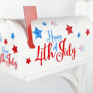 May include: White mailbox decorated with red, white, and blue glitter stars and the text "Happy 4th of July" in red cursive lettering.