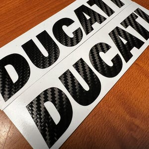 2pcs Ducati carbon stickers decals for helmet or motorcycle Carbon vinyl fuel tank fairing bike window
