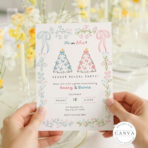 Beautifully designed gender reveal party invitation held in a hand, featuring a floral design with a blue and pink color scheme. The text "He or She?" is centered with illustrated Christmas trees adorned with blue and pink bows. It announces the "GENDER REVEAL PARTY!" for Avery & Davis on December 15 at 8:30 PM, with RSVP details included. A Canva logo indicates it's an editable template. 🎉🎄💖💙