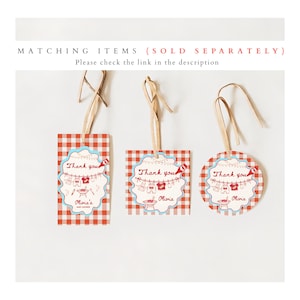 May include: Three baby shower gift tags with red and white gingham pattern. Each tag has a light blue and white scalloped border with the text "Thank you" and "Olivia's Baby Shower". The tags are tied with a natural-colored ribbon.