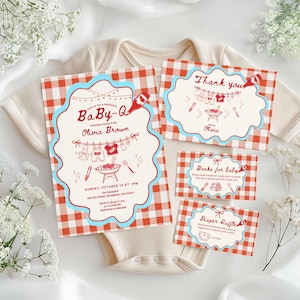 Baby-Q shower invitation suite with red gingham borders and blue scalloped edges, displayed on cream onesie with baby's breath flowers. Includes main invitation honoring Olivia Brown (Sunday October 10, 1PM, 456 Elm Street), thank you card, book request card, and diaper raffle card. Features clothesline with baby items and BBQ grill illustrations.