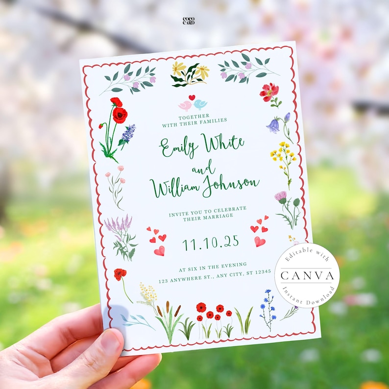 A wedding invitation card held against a backdrop of blooming spring trees. The card features a scalloped red border and colorful wildflowers, including red poppies and lavender. It invites guests to celebrate Emily White and William Johnson's marriage on November 10, 2025, at six in the evening. The design includes charming bird illustrations and a Canva watermark.