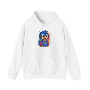 May include: White hoodie with a cartoon bird character in the centre. The bird is wearing headphones and a blue and red outfit. The design is set against a backdrop of colourful paint splatters. It has a kangaroo pocket.