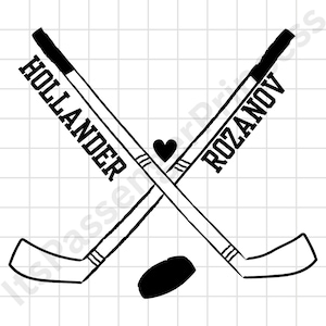 May include: Black and white graphic of two crossed hockey sticks with the names "HOLLANDER" and "ROZANOV" printed on them. A black heart is between the sticks, and a black hockey puck is below.