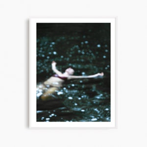 Framed Swimming Art Print: Ethereal Woman in Dark Water