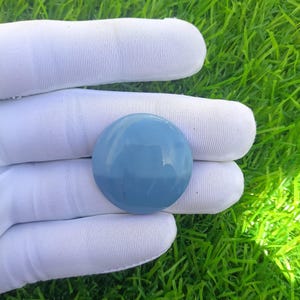 May include: A set of three ceramic mugs with a speckled, matte finish. The mugs are in shades of cream, light gray, and dark gray. Each mug has a simple, minimalist design, perfect for coffee or tea.