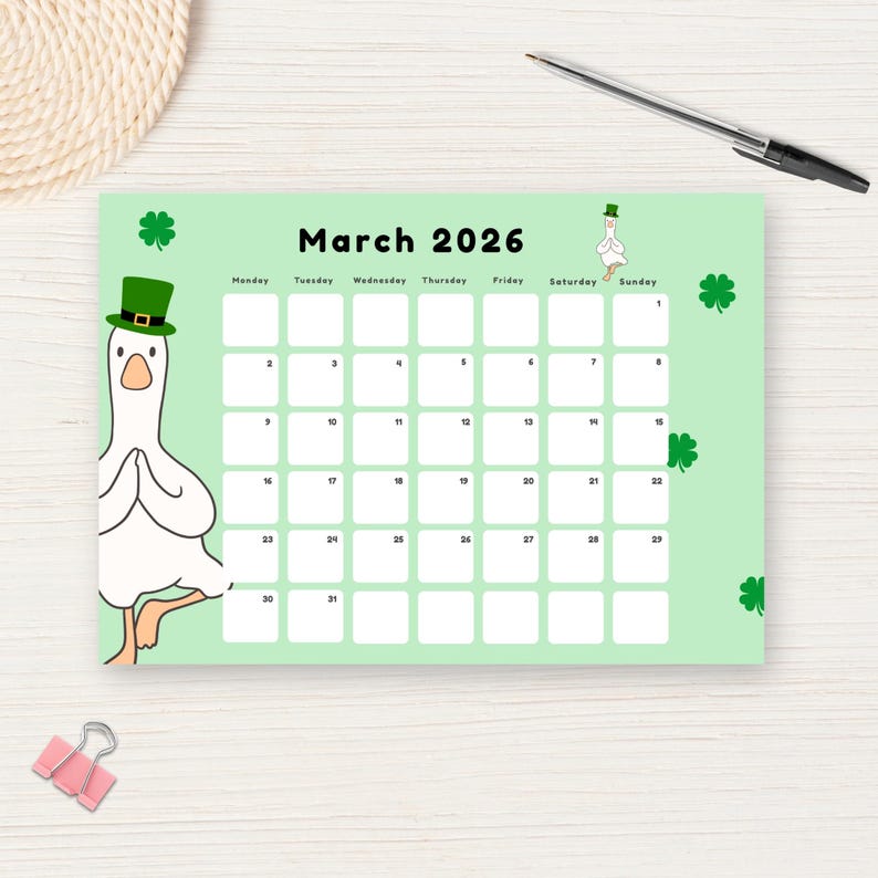 May include: A green March 2026 calendar featuring a cartoon goose wearing a green hat. The calendar has a light green background with white boxes for each day. Shamrock designs are scattered around the calendar.