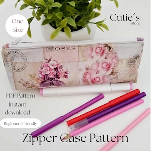 May include: A rectangular zipper case with a floral rose design, the text "Roses" is visible. The image also shows several pens and markers. The text "PDF Pattern", "Instant download", "Beginners Friendly", and "Zipper Case Pattern" are also visible.