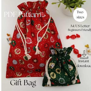 May include: Two drawstring gift bags, one red and one green, with a festive pattern of ornaments. The bags have white drawstrings and are labeled "PDF Pattern" and "Gift Bag". The image also includes the text "Two sizes" and "Instant download".
