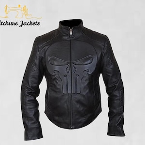 May include: Black leather jacket with a high collar and a full-zip closure. The jacket features a large skull emblem on the chest. The text "Stitchure Jackets" is visible in the upper left corner.