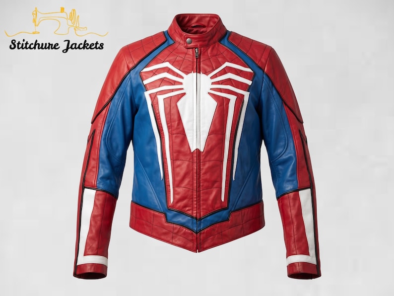 May include: A red and blue leather jacket featuring a large white spider emblem on the chest, a stand-up collar with a snap button, and a full-length front zipper. The design includes quilted paneling and white accents on the sleeves and torso.