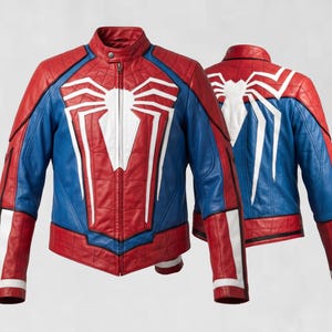 May include: A red and blue leather jacket featuring a large white spider emblem on the chest and back. The jacket has a stand-up collar, a front zipper closure, and white accents on the sleeves. The design includes quilted paneling details.