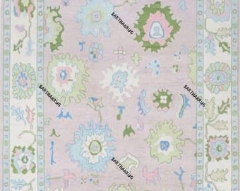 Hand-Knotted Pink Oushak Wool Rug: Soft Antique Carpet