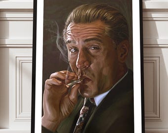 Puede incluir: Retrato enmarcado de un hombre fumando un cigarrillo. La obra de arte presenta una paleta de colores oscuros, con el sujeto vistiendo un traje y corbata. La imagen se muestra sobre un suelo de madera, apoyada en una pared blanca.