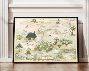 May include: A framed watercolor map of a fictional place, featuring trees, rivers, and landmarks. The map is in a black frame and has a compass rose in the upper left corner. The map is on a wooden floor.