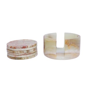 May include: A stack of five round stone coasters featuring swirling patterns of cream, tan, and reddish-brown hues, accompanied by a matching cylindrical stone coaster holder with a vertical cutout opening, showcasing a polished, smooth, natural finish.