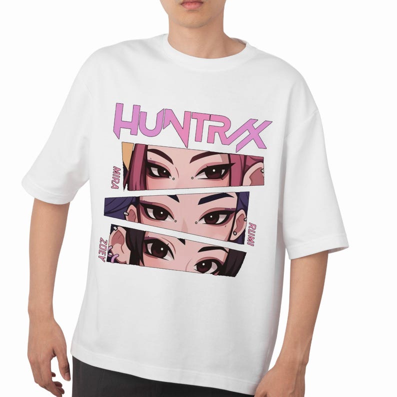 A product mockup showing a vibrant Huntrix Kpop Demon Hunters graphic applied to a physical item. The print highlights the vivid colors and crisp details of the Saja Girls anime PNG design, demonstrating its perfect application for sublimation and DTG printing.