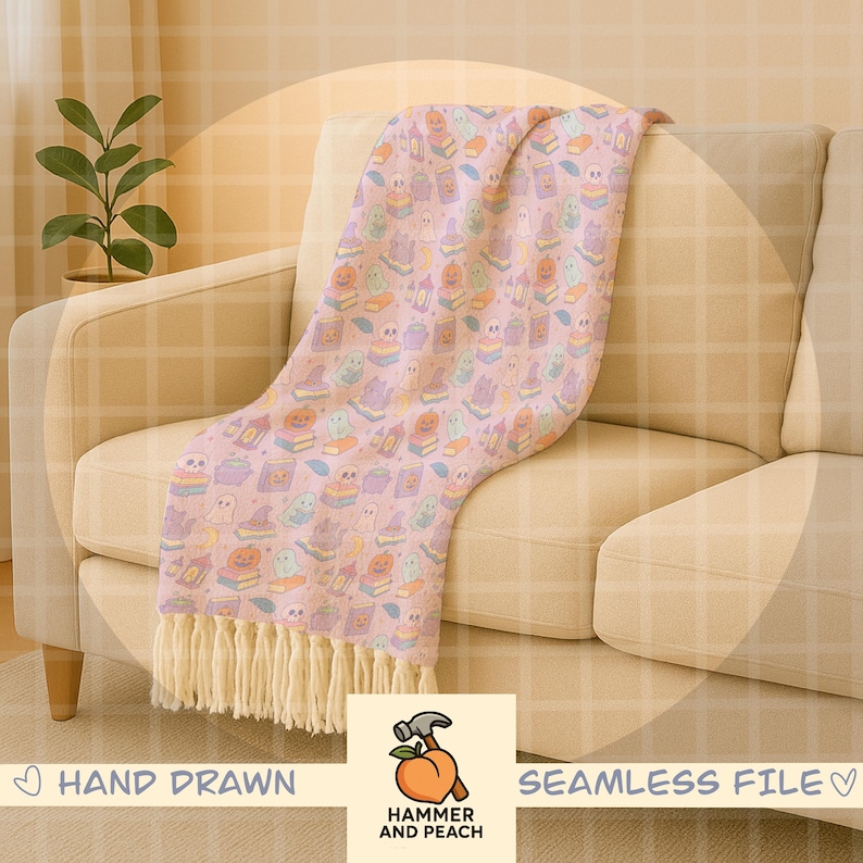 May include: A light pink throw blanket with a repeating pattern of Halloween-themed illustrations, including ghosts, pumpkins, and books. The blanket has a fringe trim and is draped over a beige sofa. The words "HAND DRAWN" and "SEAMLESS FILE" are visible.