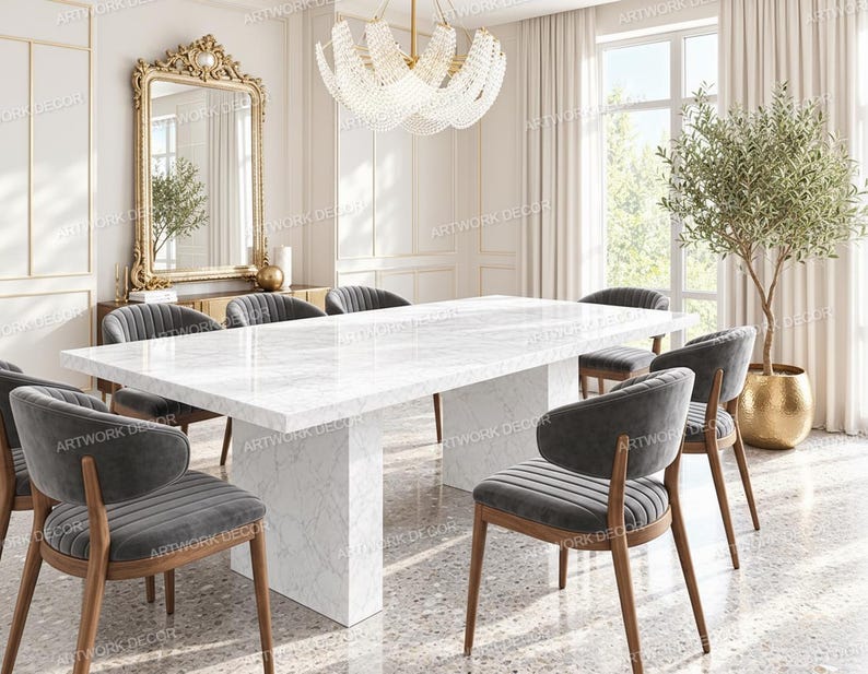 May include: A rectangular white marble dining table with a thick pedestal base, surrounded by six dark gray upholstered chairs with wooden legs. The chairs feature vertical channel tufting on the backrests and curved, rounded armrests.