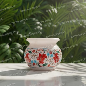 May include: A white marble vase with a floral design in red, blue, and green. The vase has a rounded body and a flared rim. The floral pattern is intricate and detailed, adding a touch of elegance to the decorative piece.