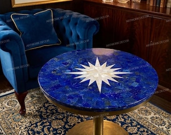 May include: A round side table featuring a vibrant blue lapis lazuli mosaic tabletop with a central white mother-of-pearl star inlay. The table is supported by a single cylindrical brass pedestal base that rests on a circular brass plate.