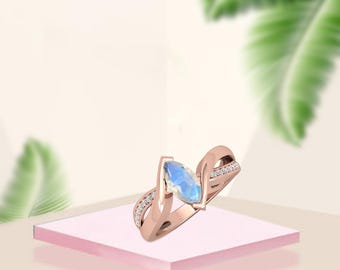 Sculptural Marquise Moonstone Engagement Ring With Twisted Band Wedding Ring June Birthstone Ring Statement And Delicate Nature Jewelry.