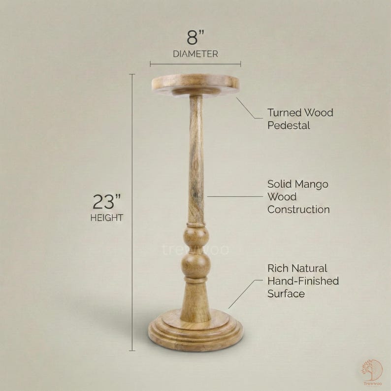 May include: A turned wood pedestal with a rich, natural, hand-finished surface. The solid mango wood pedestal is 23 inches high and 8 inches in diameter. The pedestal has a round base and a turned wood design.