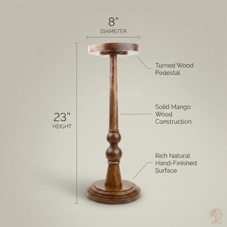 May include: A turned wood pedestal with a rich, hand-finished surface. The solid mango wood construction has a diameter of 8 inches and a height of 23 inches.