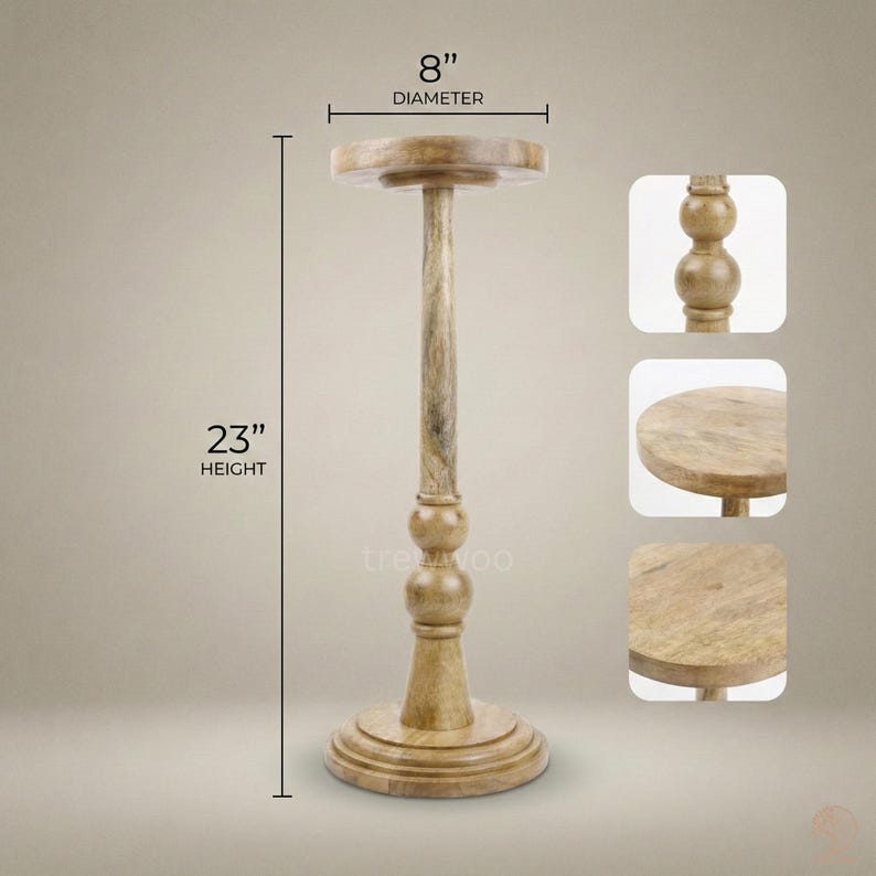 May include: A wooden pedestal stand with a round top, 8 inches in diameter, and a height of 23 inches. The stand has a decorative base and a central column with a series of rounded accents. The wood has a natural, light brown finish.
