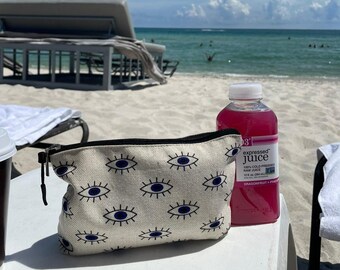 evil eye makeup bolsa