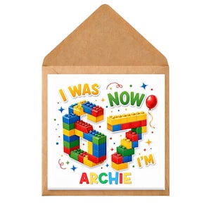 May include: A square greeting card in a brown envelope featuring the text I WAS NOW 67 I'M ARCHIE. The numbers 6 and 7 are constructed from colorful interlocking plastic building blocks in red, blue, yellow, and green, surrounded by confetti and a red balloon.