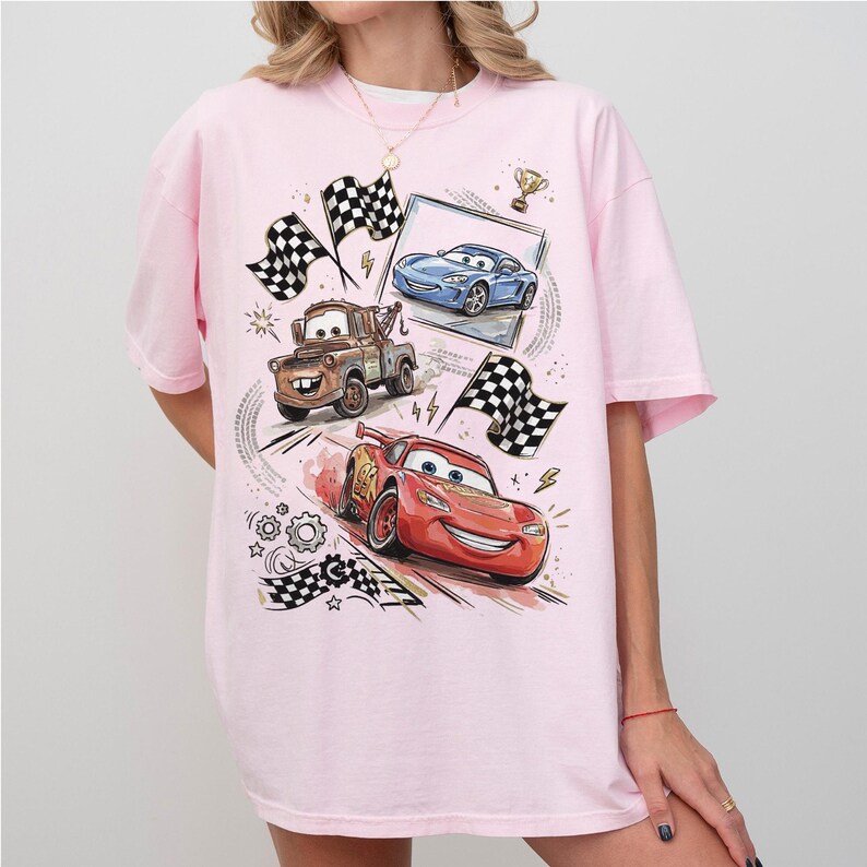 May include: A white ceramic mug with a black handle and the text "But First, Coffee" in a handwritten style. The mug is on a white surface. The mug is 4 inches tall.