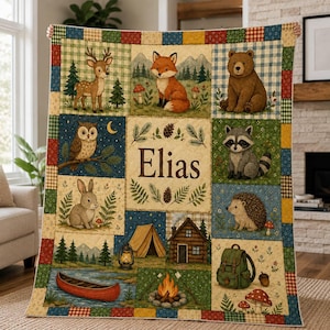 May include: A rectangular quilt featuring a patchwork border of red, blue, green, and yellow squares. The center displays illustrations of a deer, fox, bear, owl, rabbit, raccoon, and hedgehog, alongside a tent, cabin, canoe, and backpack. The name Elias is printed in the center.