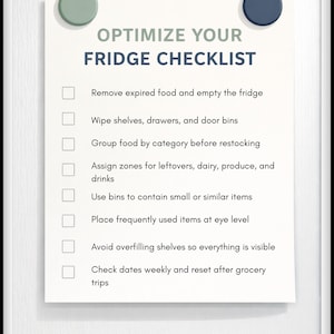 May include: A white paper checklist titled "Optimize Your Fridge Checklist" with a list of tasks to organize a refrigerator. The checklist is held in place by two round, green and blue magnets.