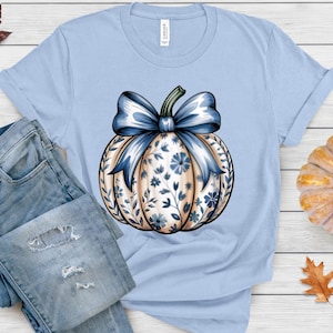 “Pumpkin Season graphic tee in muted blue, autumn pumpkin design, unisex Bella+Canvas shirt.”