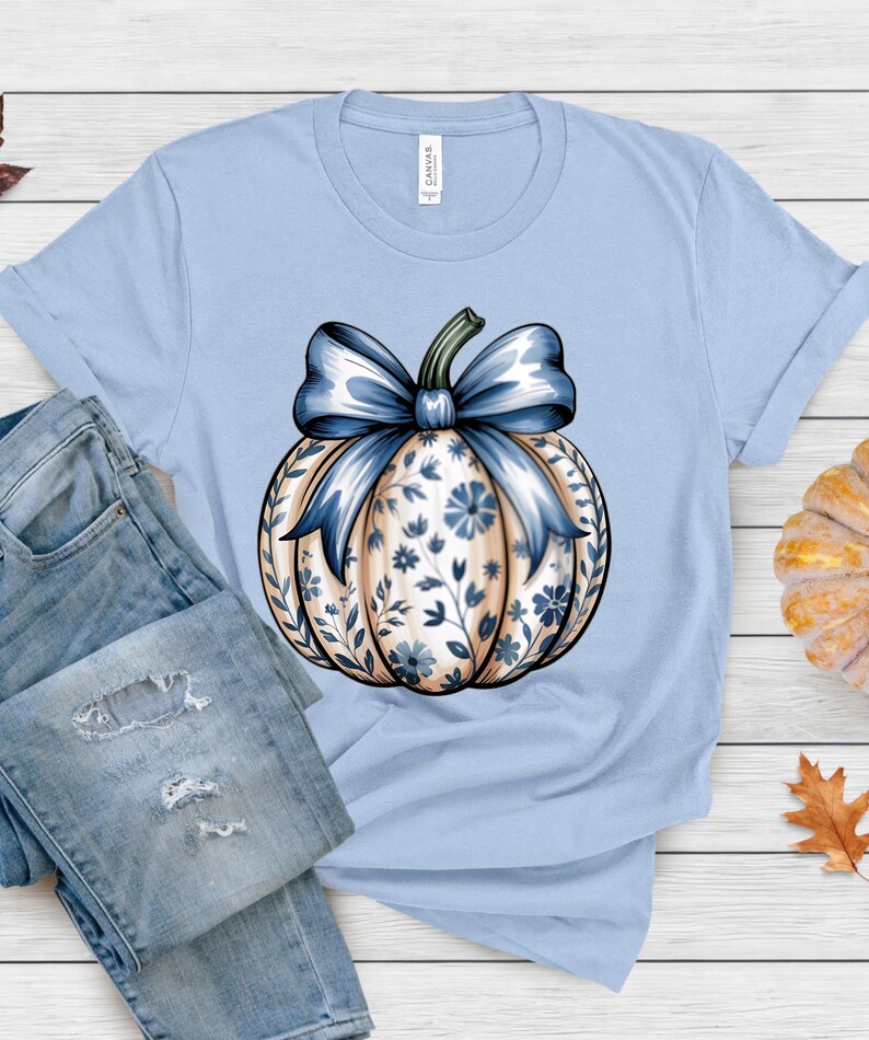 “Pumpkin Season graphic tee in muted blue, autumn pumpkin design, unisex Bella+Canvas shirt.”