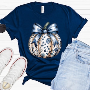 “Pumpkin Season graphic tee in navy blue, autumn pumpkin design, unisex Bella+Canvas shirt.”
