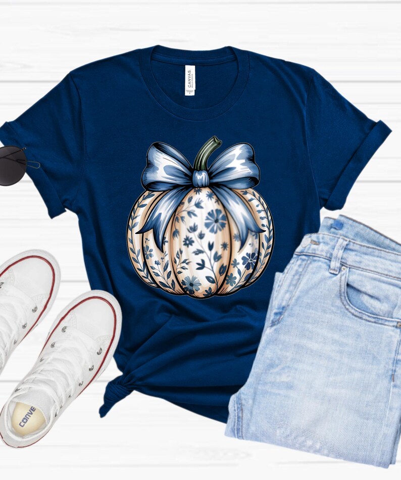 “Pumpkin Season graphic tee in navy blue, autumn pumpkin design, unisex Bella+Canvas shirt.”