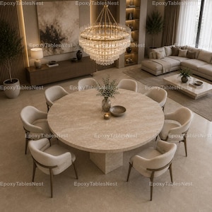 May include: A contemporary dining space with a circular stone table and eight cream chairs. A large, decorative chandelier hangs above. The room has a neutral colour scheme with wooden features and a beige sofa.