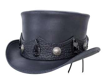 May include: A black leather top hat with a wide brim and a textured band. The band is adorned with silver-colored studs and decorative accents. The hat has a classic, slightly curved shape and black ties.