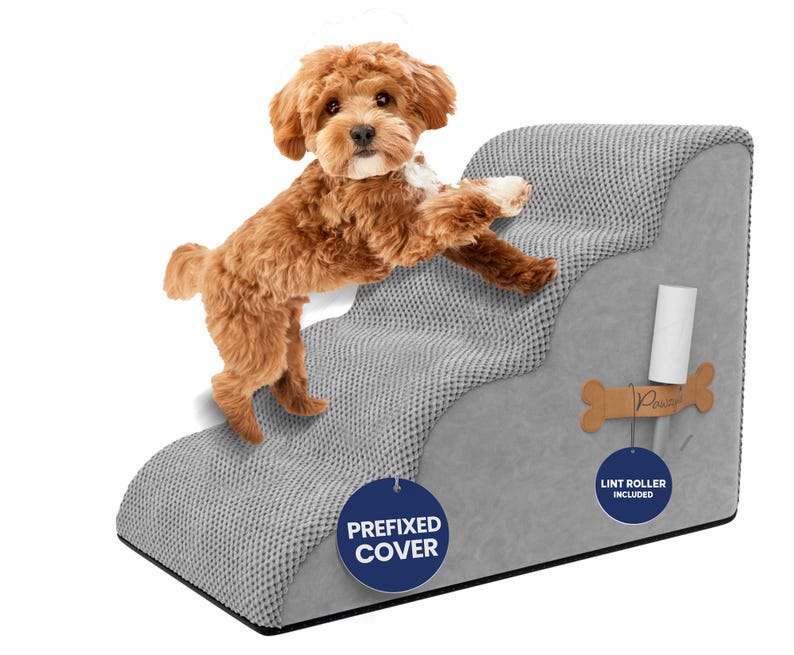 May include: A gray pet step with three tiers, featuring a textured surface and a smooth side. A small, brown dog is climbing the steps. Includes a lint roller. The step has a "Prefixed Cover" label.