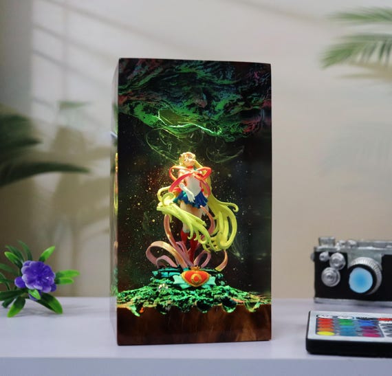 A detailed Sailor Moon figure encased in a glowing resin lamp diorama — 88 favorites proves this is a genuinely beloved, clearly handcrafted fan-art piece.